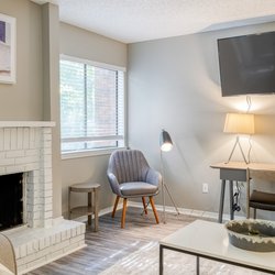 living room model unit at 100 Inverness Apartments in Birmingham, AL