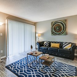 living room model unit at 100 Inverness Apartments in Birmingham, AL