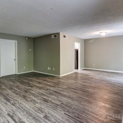 wooded floor living room at 100 Inverness Apartments in Birmingham, AL