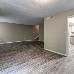 wooded floor living room at 100 Inverness Apartments in Birmingham, AL